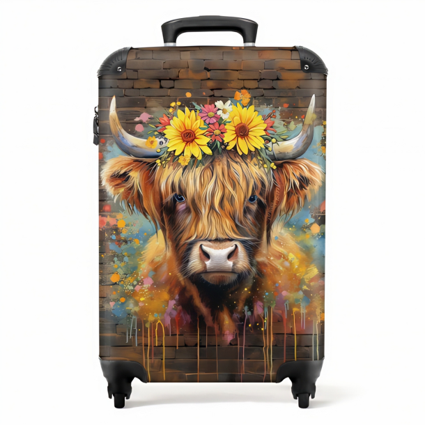 Reiskoffer Schotse Hooglander met bloemen.