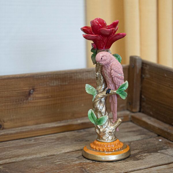 Speelse roze papegaai kandelaar