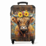 Reiskoffer Schotse Hooglander met bloemen.