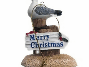 beeldje Zeemeeuw op Paalhoofd Merry Christmas